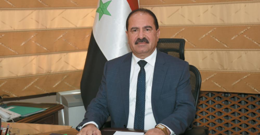 وزير سوري يزور بلد عربي !