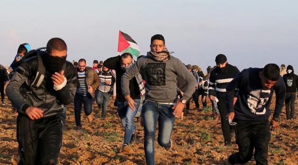 استشهاد ثلاثة فلسطينيين من غزة وإصابة 130 أخرين