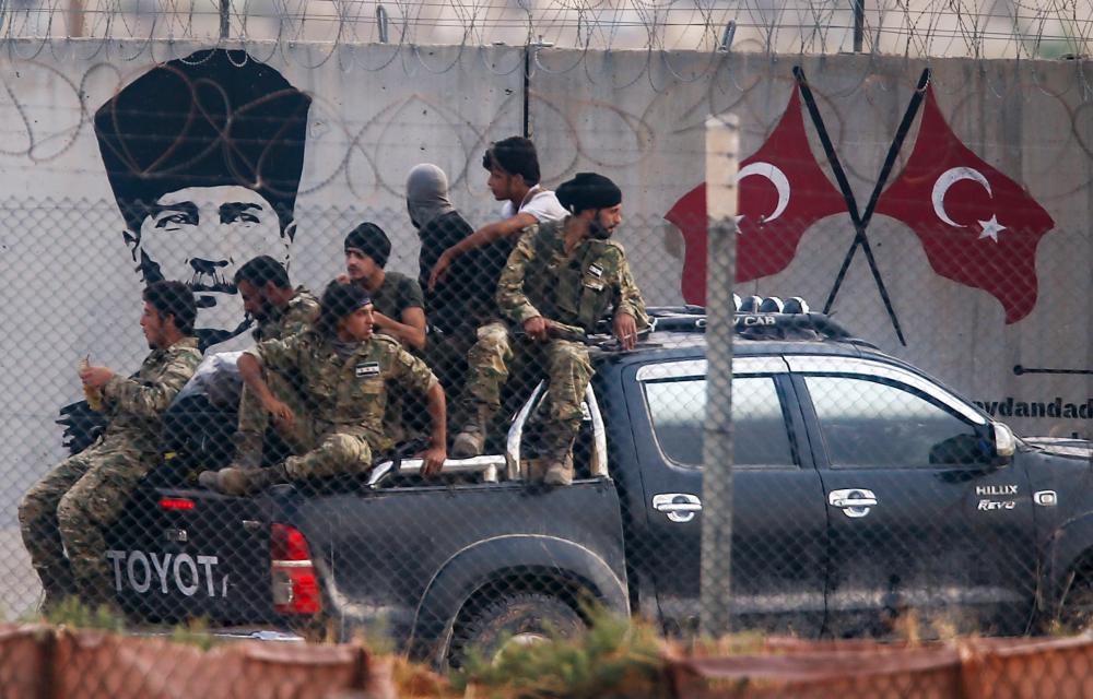 تركيا.. تحدد وجهة جديدة للمرتزقة السوريين.. إلى قطر!