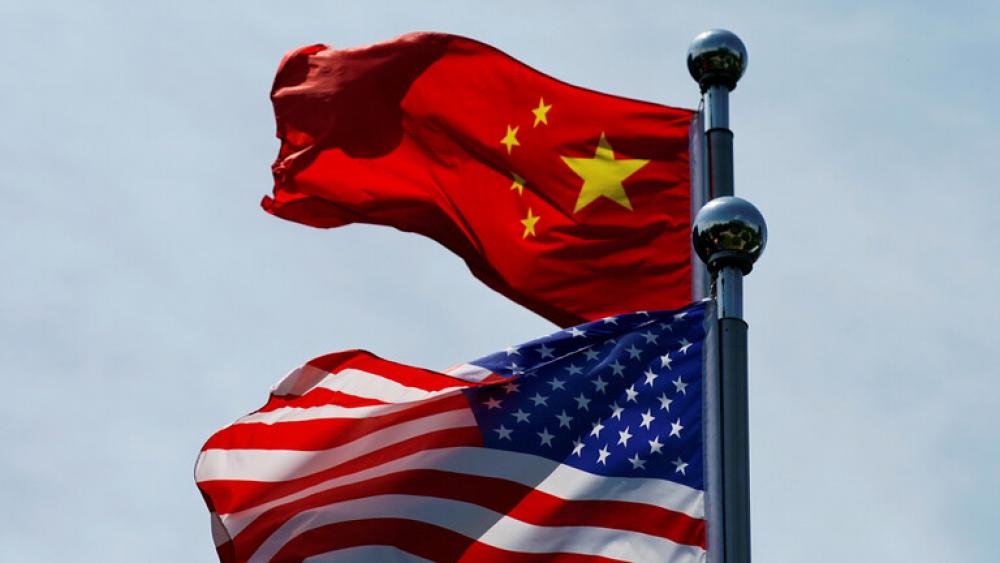 «الصين» تدعو «واشنطن» لرفع العقوبات عن شركاتها