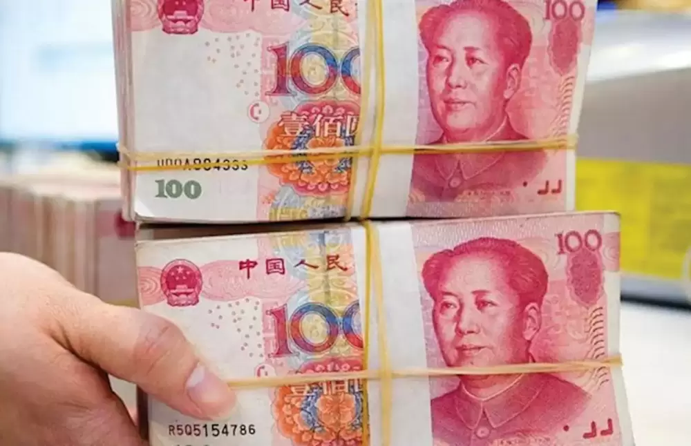 خوفاً من كورونا البنوك الصينية تعقم أوراقها النقدية