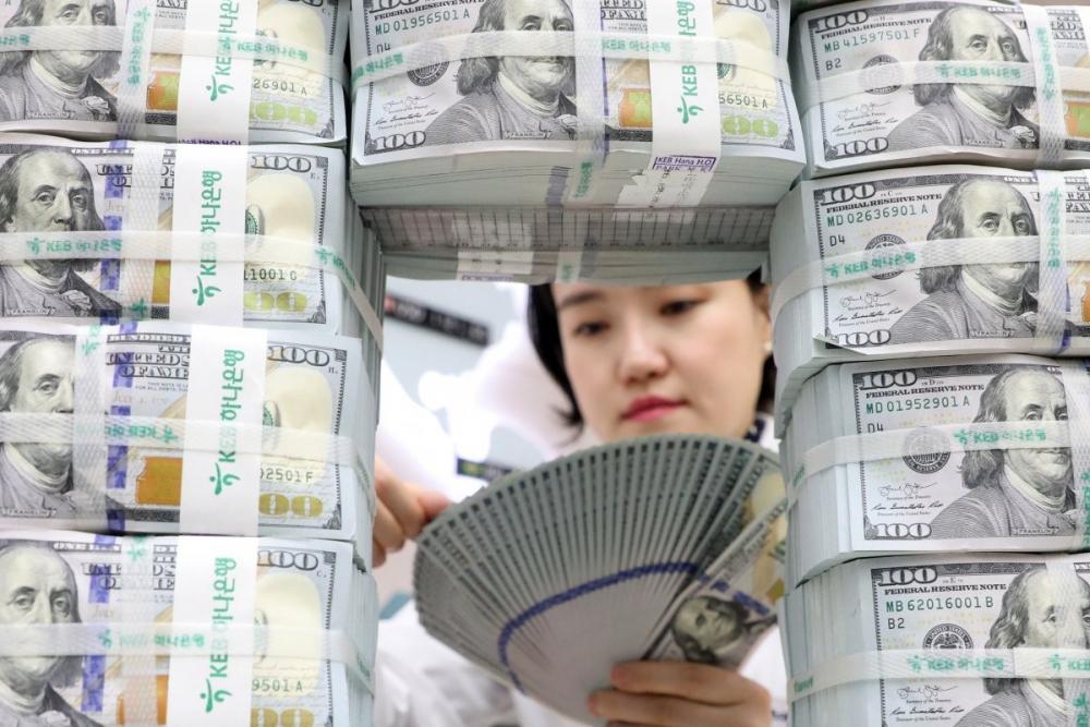 الصين تستعد للاستغناء عن الدولار الأمريكي